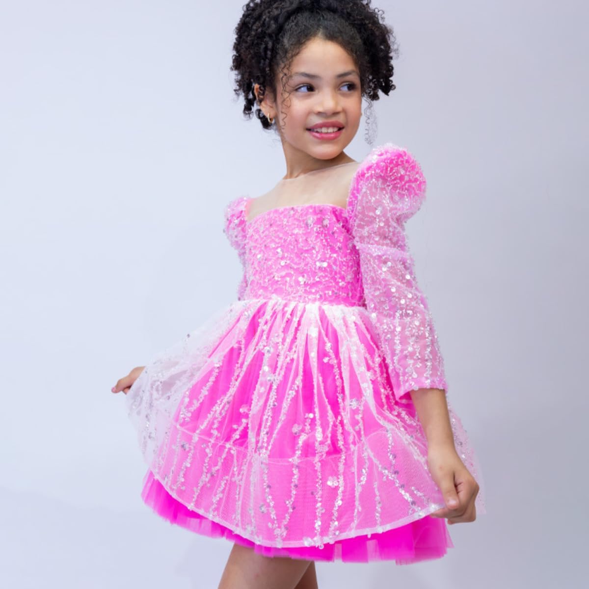 Girl's dress with sequins and puffed skirt