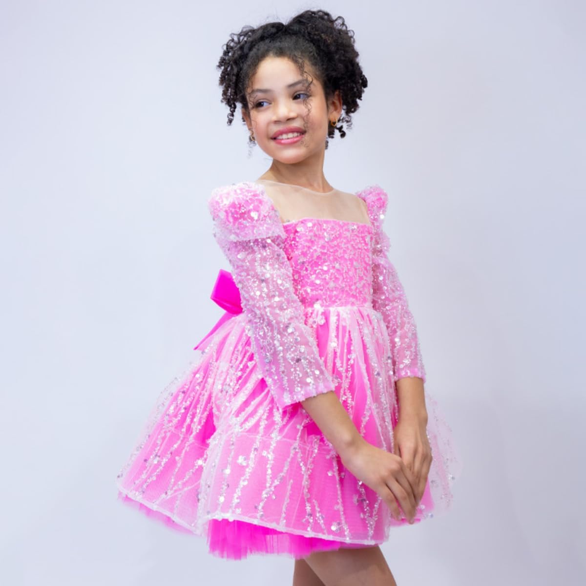 Girl's dress with sequins and puffed skirt
