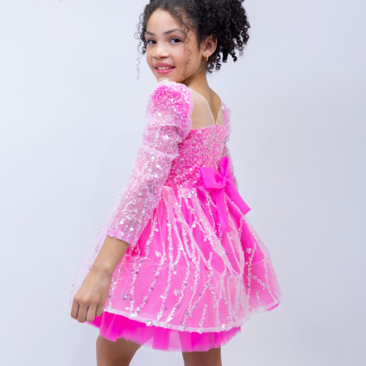Girl's dress with sequins and puffed skirt